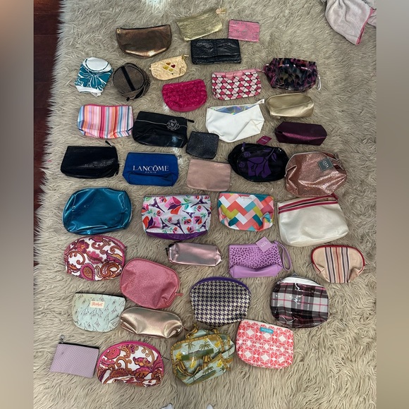 Lancome Handbags - Lot of 38 makeup/cosmetic bags